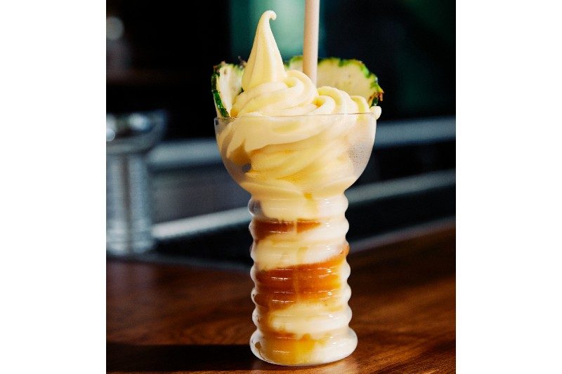 Ice cream cocktail the dole whip in a unique glass.