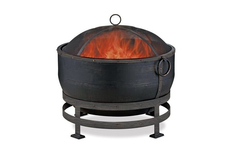bronze finished kettle style wood fire pit.
