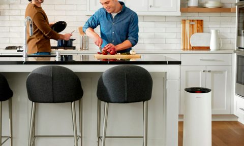 Filtrete Smart Air Purifier in kitchen cleaning air.