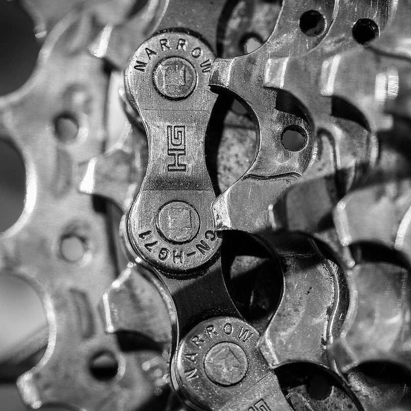 Close up of a bike chain on cassette.