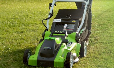 Greenworks 40V Push Start Lawn Mower in use to cut grass.