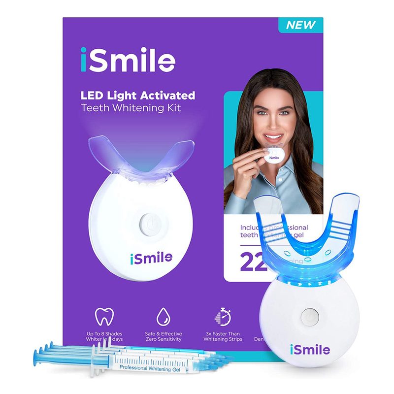 iSmile teeth whitening kit with products outside of box on white background.