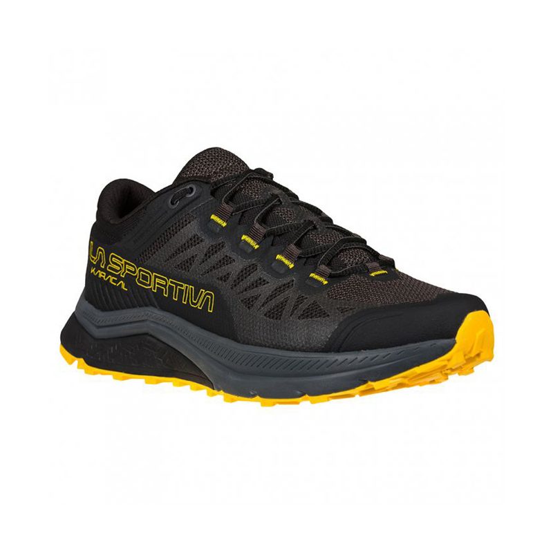 A La Sportiva Karacal shoe in black/yellow variant.