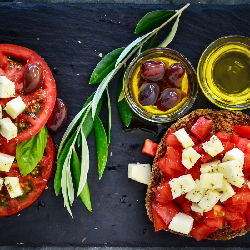 A mouthwatering tomato salad with olive oil.