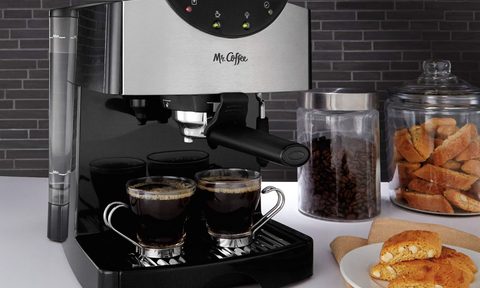 Mr. Coffee 2 Shot Pump Espresso Maker with food on counter.