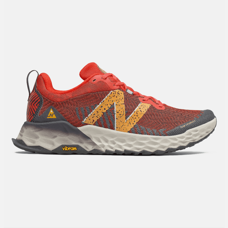 A New Balance Fresh Foam Hierro v6 shoe in Ghost pepper with habanero variant.