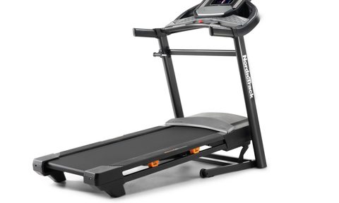 NordicTrack C700 Folding Treadmill with 7-inch touchscreen display on white background.