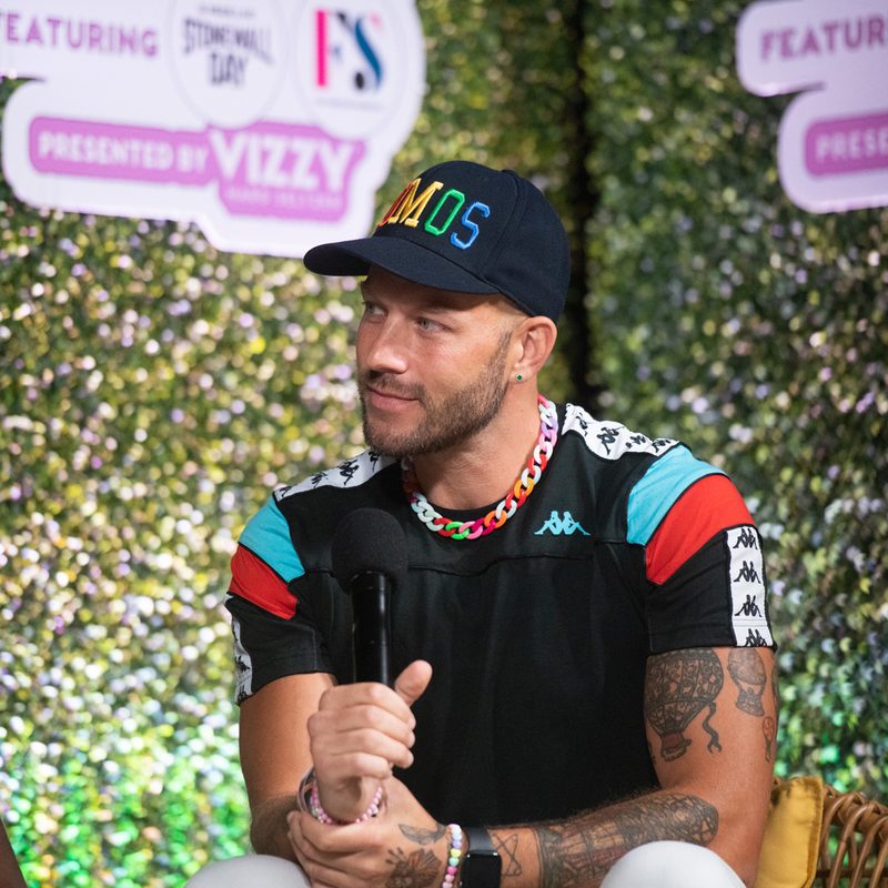 Designer Johnny Wujek attending the OUTLOUD: Raising Voices Concert Series.