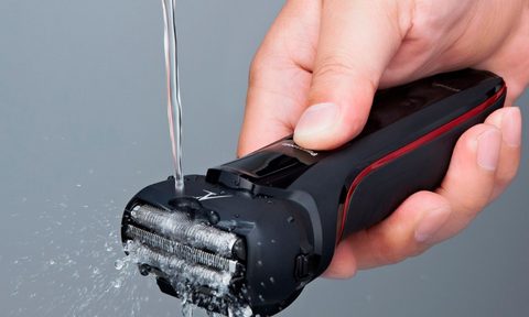 Panasonic Arc3 Wet and Dry Electric Shaver under water stream.