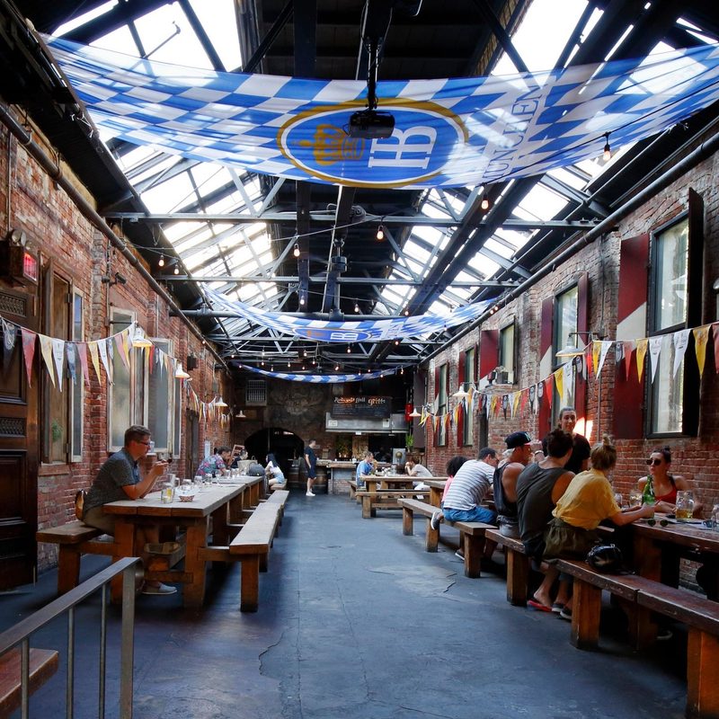 Radegast Hall in New York with people hanging out.