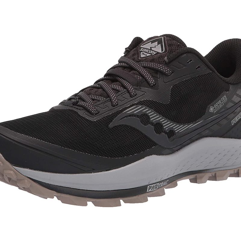 A Saucony Peregrine 11 shoe in black/gravel variant.