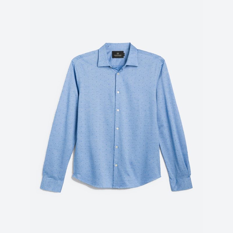 A blue knitted dress shirt with dots.