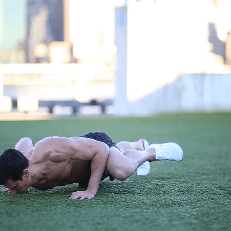 Marc Perry showing how to do a Spider-Man push-up.