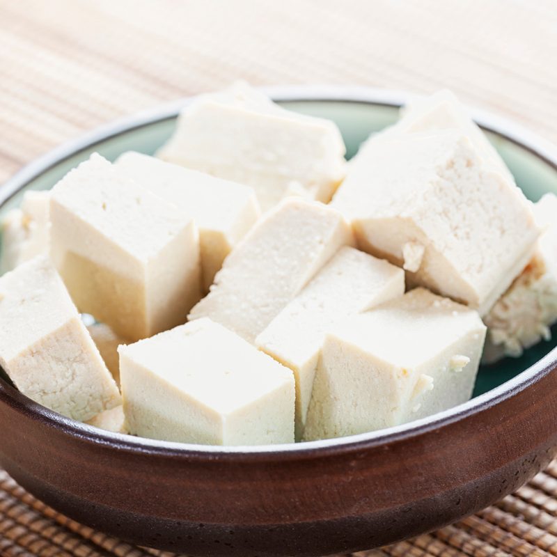 Cubes of tofu in a small bowl.