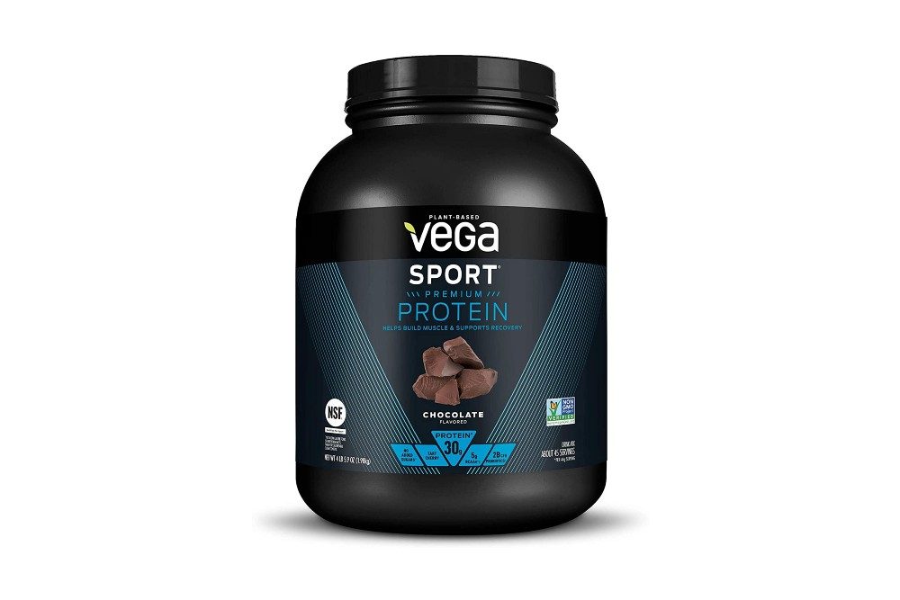 A container of Vega Sport Chocolate Protein Powder on a white background.