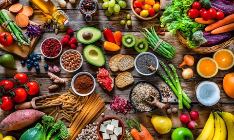 A bird's-eye view of healthy foods on a table.