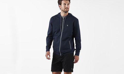 Man wearing sweat shorts.
