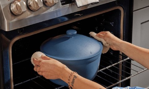 A blue Perfect Pot emerging from the oven.
