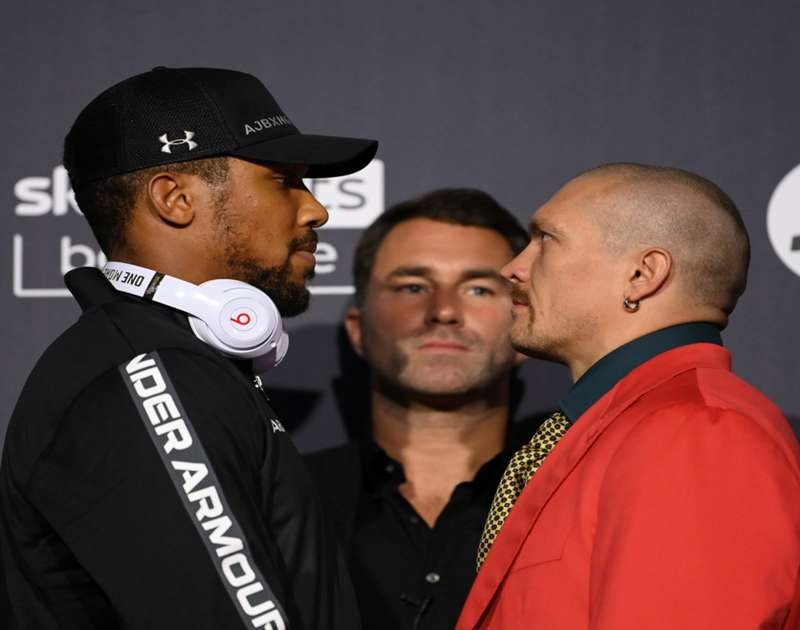 Anthony Joshua and Oleksandr Usyk at weigh-in before big match.