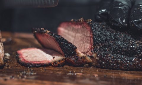 BBQ Brisket being sliced by hand.