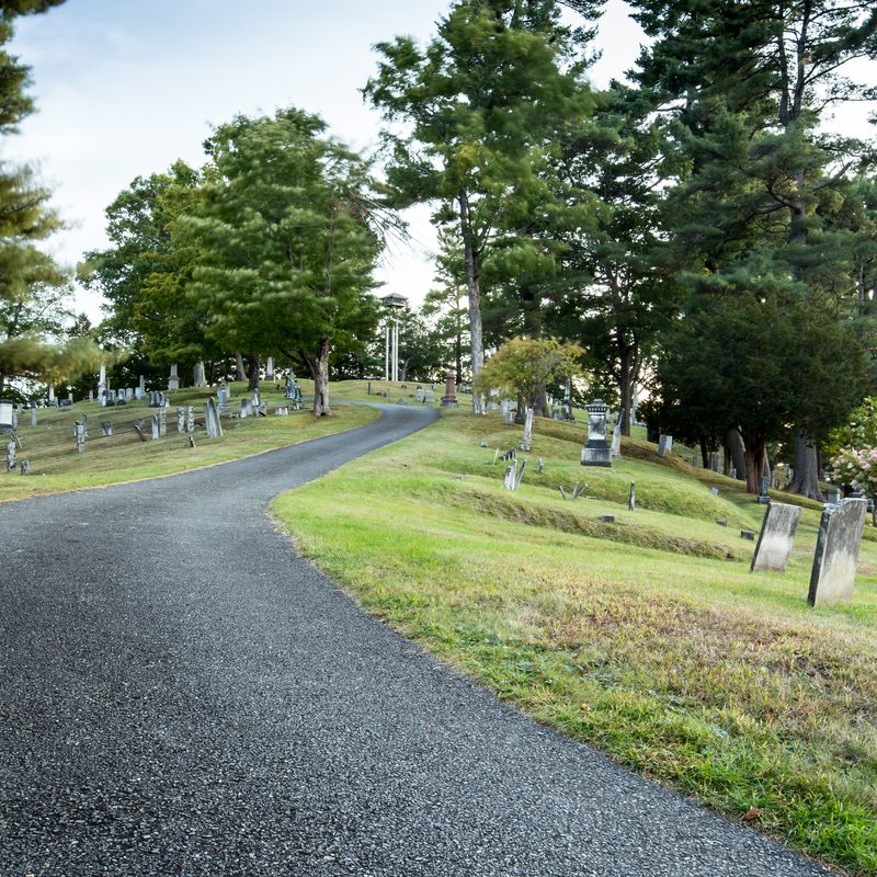 Turn of a road thru a graveyard in Bangor Maine.