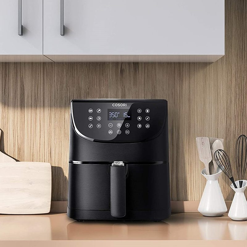 COSORI Air Fryer Max XL installed in a modern kitchen.