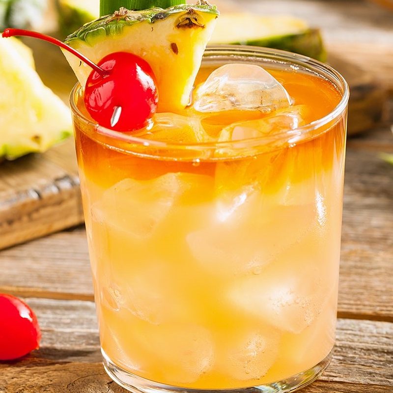 Mai Tai with pineapple and cherry on top.