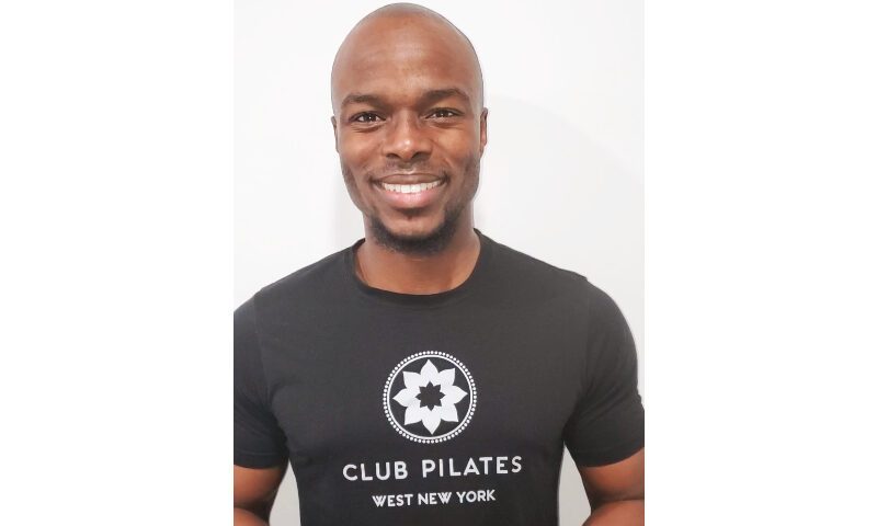 Headshot of Club Pilates instructor Dr. Femi Betiku.