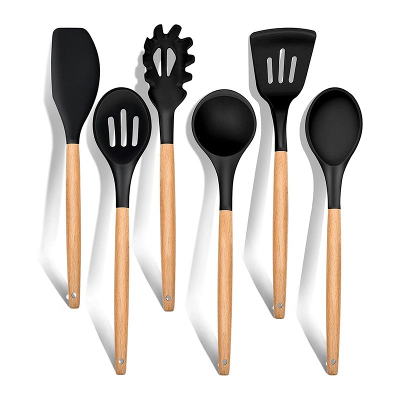 Silicone kitchen utensils with wooden handles.
