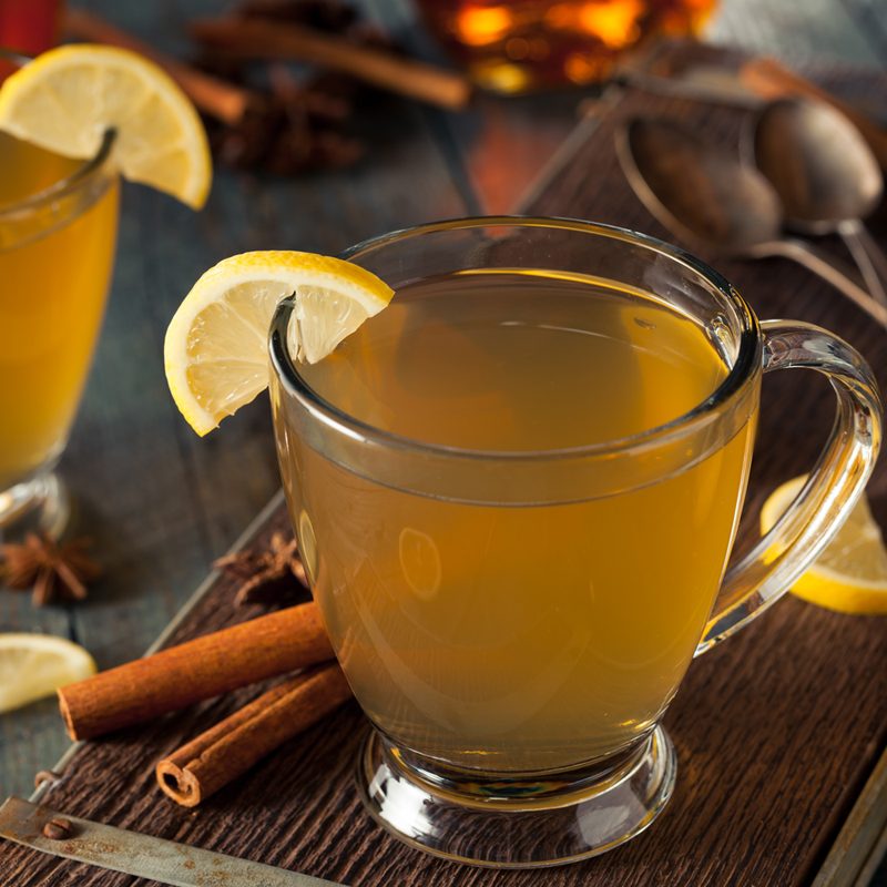 A Hot Toddy with lemon slices.