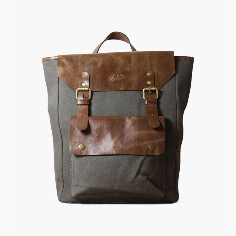 The front design of the Florsheim Orazio Canvas and Leather Backpack.