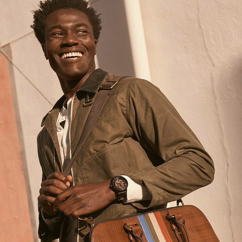 A man wearing a fossil watch.