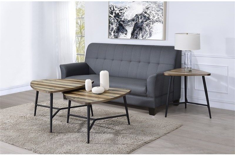 Gibson Nesting Coffee Table with sofa, lamp, and painting.
