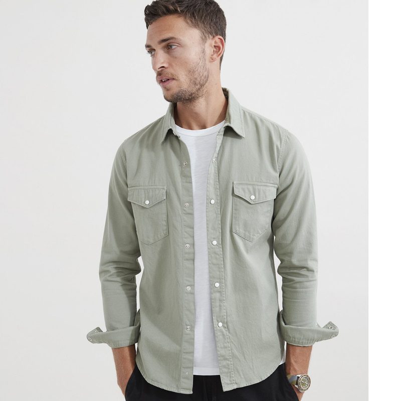 Goodlife Overdyed Denim Snap Shirt worn by a model.