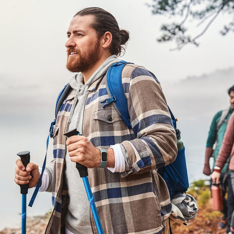 Three adventurers taking a hike.