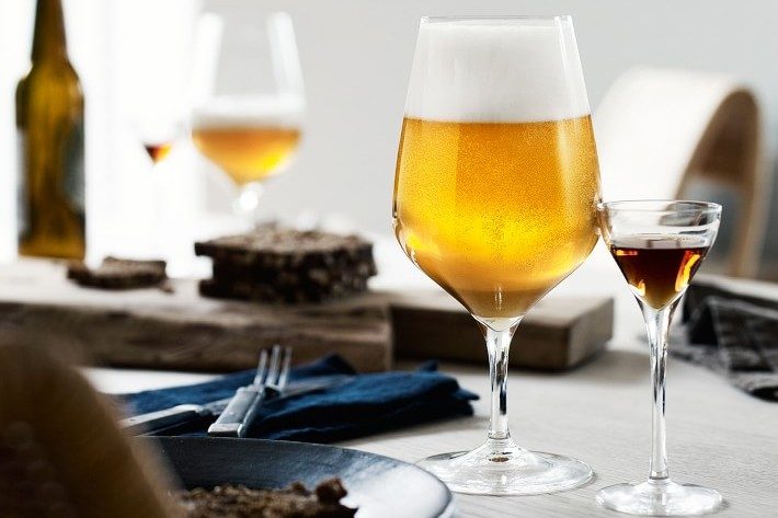 Holmegaard Cabernet Beer Glass on table.