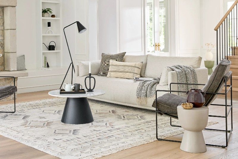 Dutch White 3 Seater Sofa inside a white-themed living room.