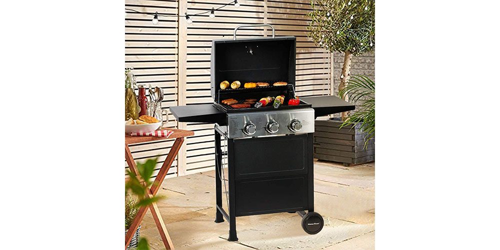 Master Cook 3 Burner BBQ Propane Gas Grill placed in a yard.