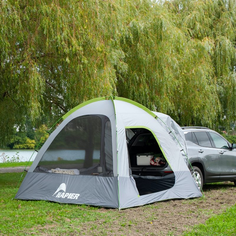 Napier Backroadz SUV tent from behind in woods.