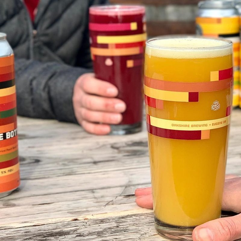 Oakshire Brewing Smoothie Sour beers on table.