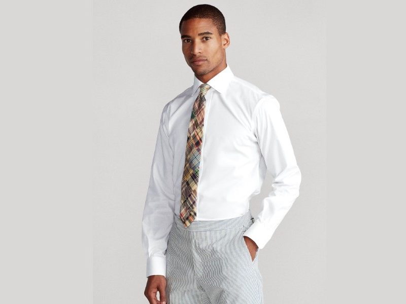 Easy Care Stretch Poplin Shirt by Polo Ralph Lauren worn by a model.