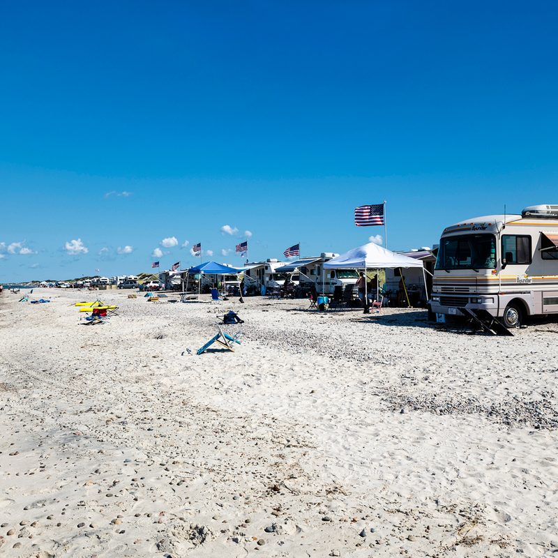 Visitors RV camping at Sandy Neck Beach Park.