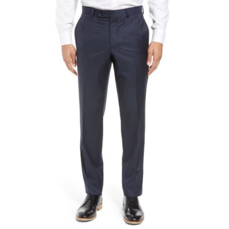 Jefferson Flat Front Wool Dress Pants by Ted Baker worn by a model.