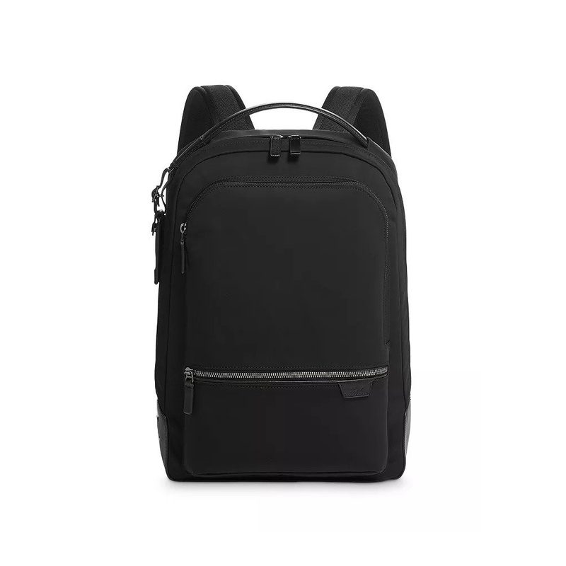 A black Tumi Harrison Bradner backpack.