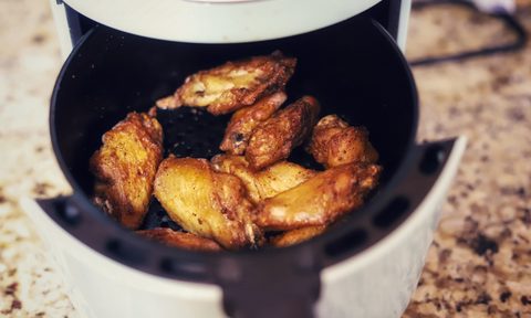 Freshly air fried chicken wings.