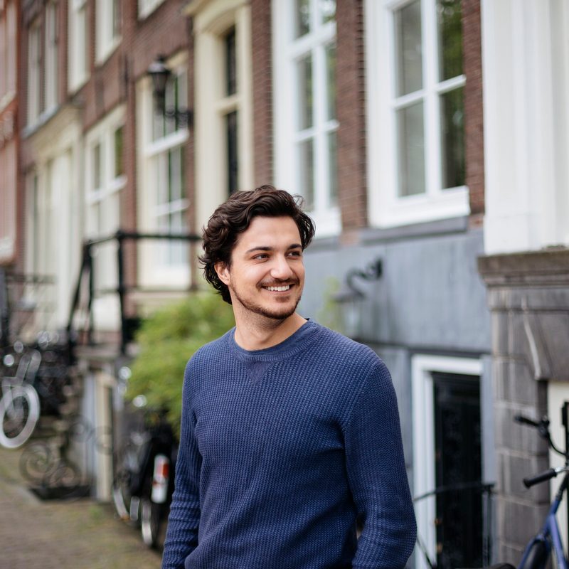 young handsome man on the streets of Amsterdam.