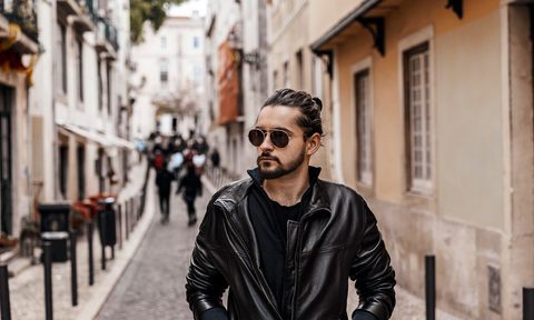 Young man wearing sunglasses In the city