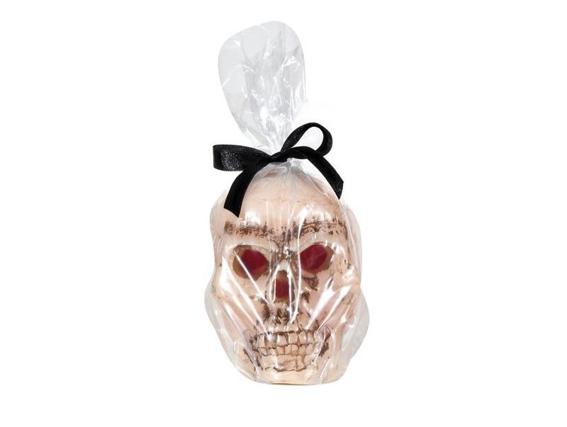 Halloween-themed bleeding skull candle.