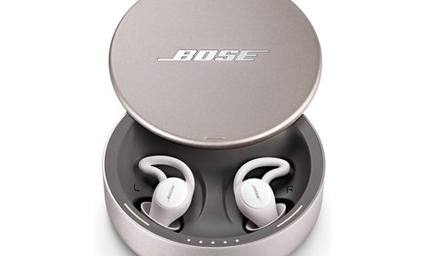 The Bose Sleepbuds II wireless earbuds inside their charging case.