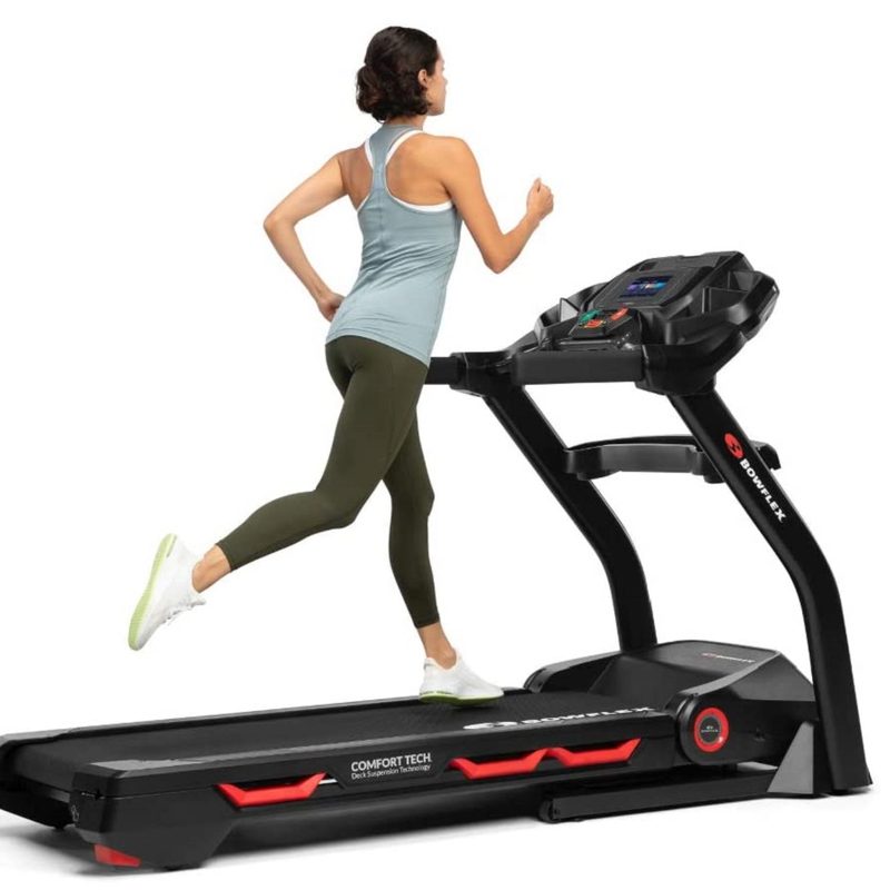 A woman working out on the Bowflex Treadmill 7.